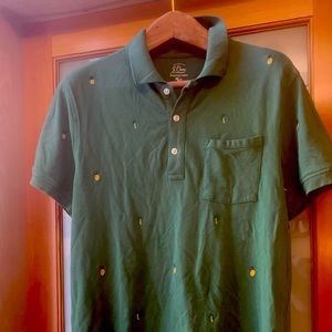 J Crew Men’s all cotton, green polo shirt with pineapple embroidered design.